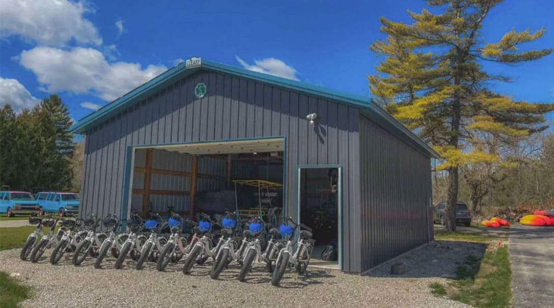 Cave-Point-1088x604 bikes in front of a garage